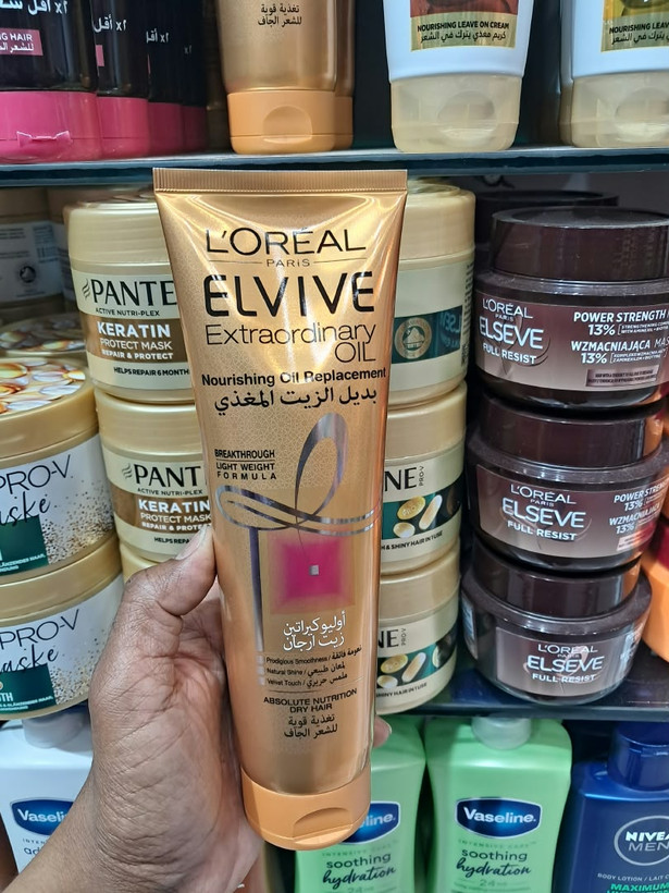 کرم مو لورآل مدل Elvive Extraordinary Oil بديل الزيت مغذی مناسب موهای خشک حجم 300 میلی لیتر